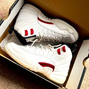 Gently used Air Jordan 12 retro white/black-university red